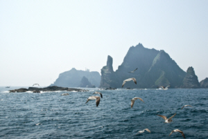 Dokdo's West Islet in foreground with Hole Rock and East Islet behind 독도 獨島 竹島 たけしま