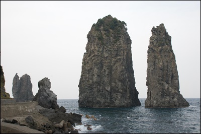 Three Angels Rocks tower on the Northeast tip of Ulleungdo Island's shore